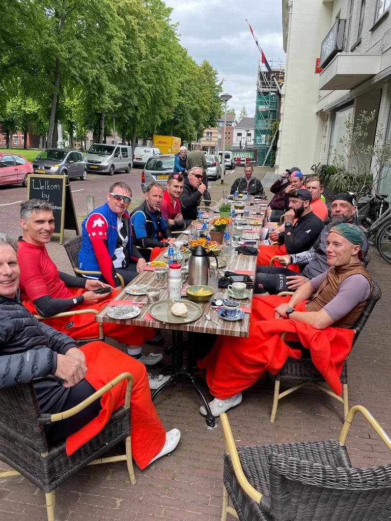 A group of riders enjoying a break together